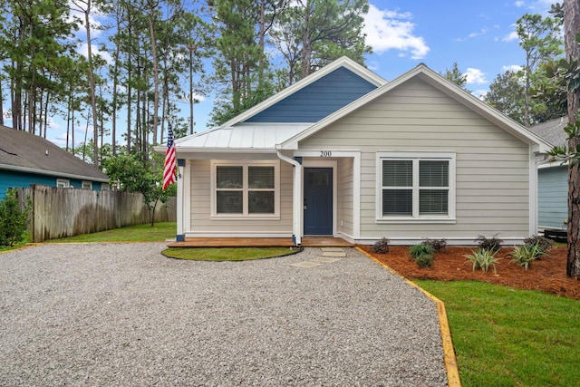 bungalow with a front lawn