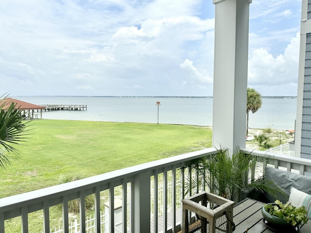 balcony featuring a water view