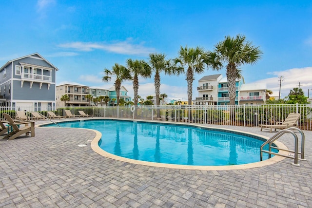 view of pool featuring a patio