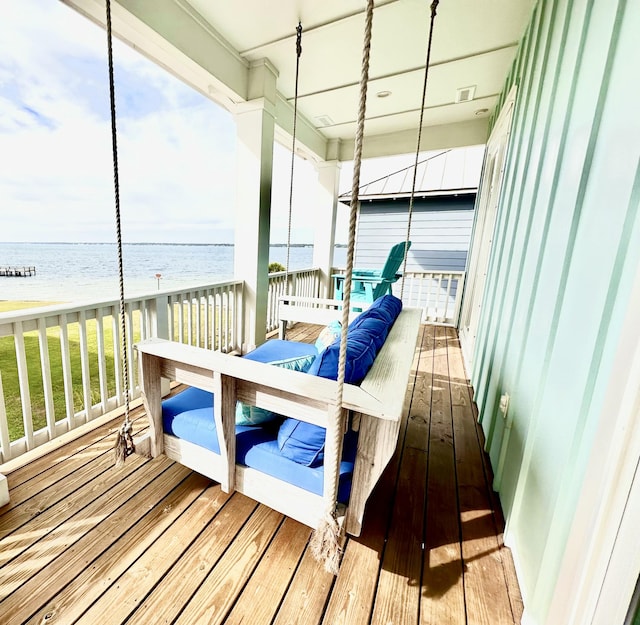 deck featuring a water view