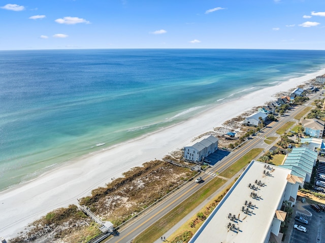 bird's eye view with a water view and a view of the beach