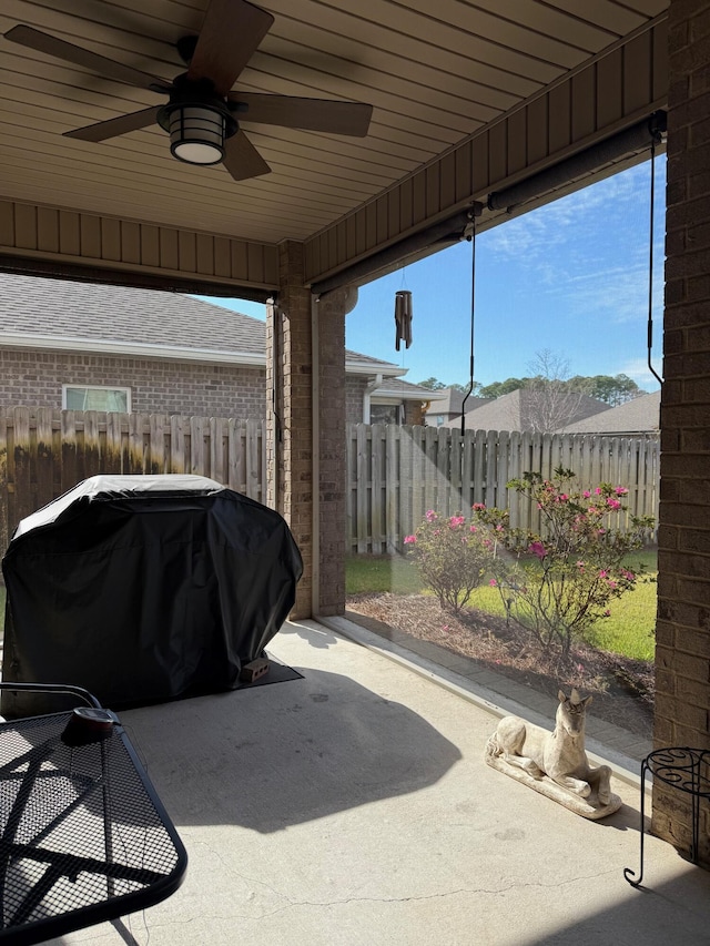 view of patio / terrace with ceiling fan and area for grilling