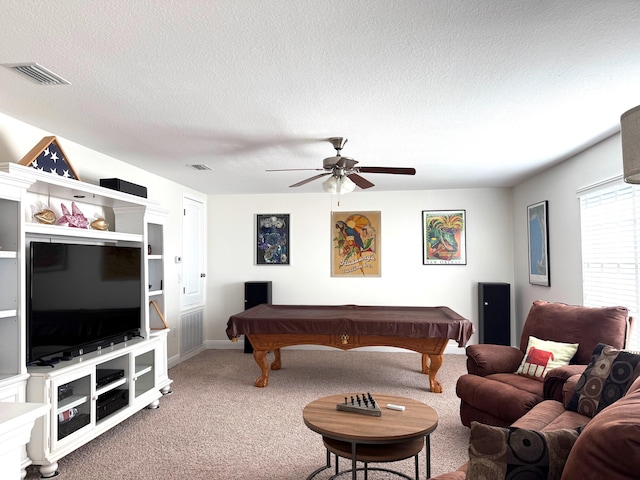 rec room featuring ceiling fan, a textured ceiling, pool table, and carpet floors