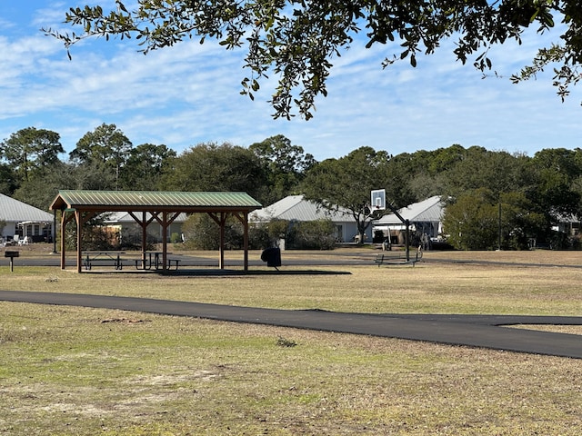 surrounding community featuring a gazebo and a yard