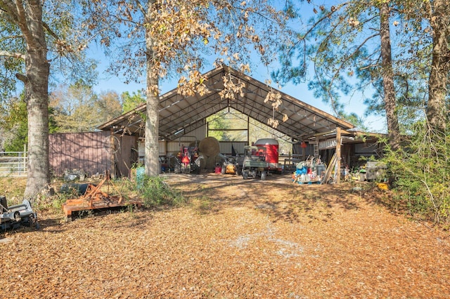 rear view of house featuring a carport