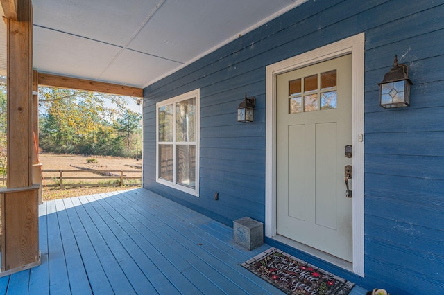 entrance to property with a porch