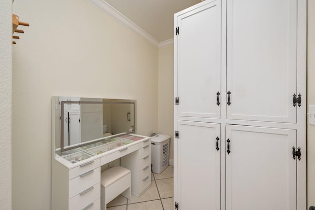 office space with light tile patterned floors and ornamental molding