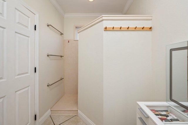 bathroom with tile patterned flooring and ornamental molding