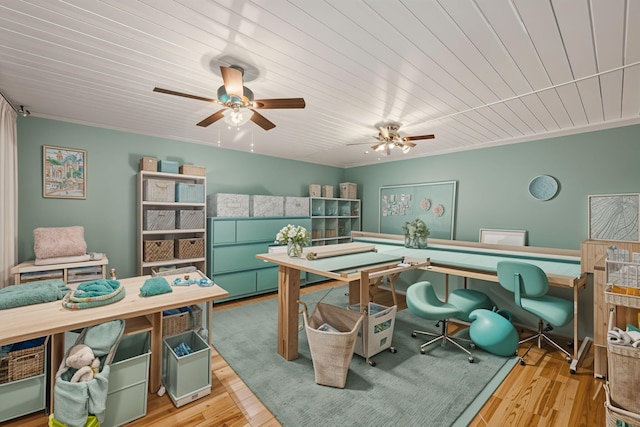 home office with wooden ceiling, ceiling fan, light hardwood / wood-style floors, and ornamental molding