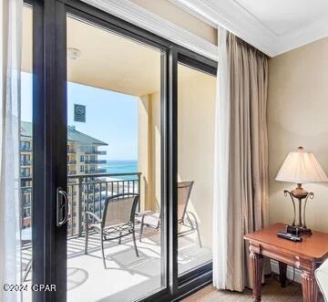 doorway to outside featuring a water view