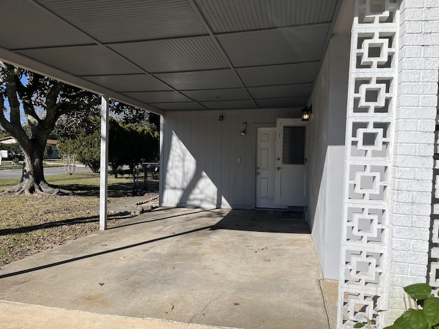 view of patio featuring a carport