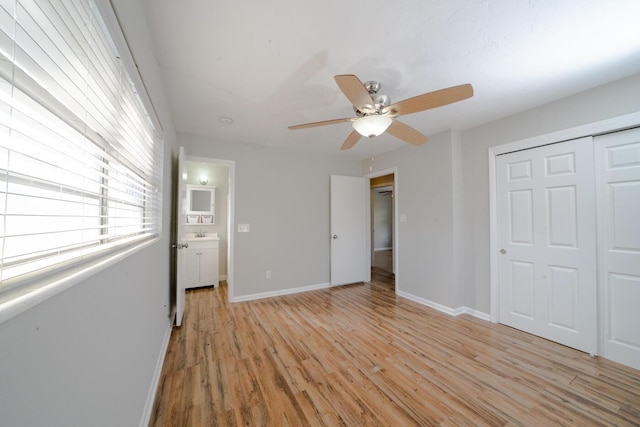 unfurnished bedroom featuring a closet, ceiling fan, and light wood-type flooring