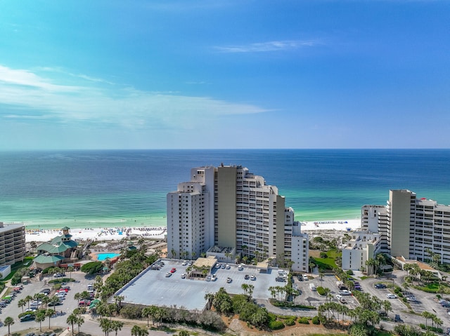 bird's eye view featuring a water view and a view of the beach