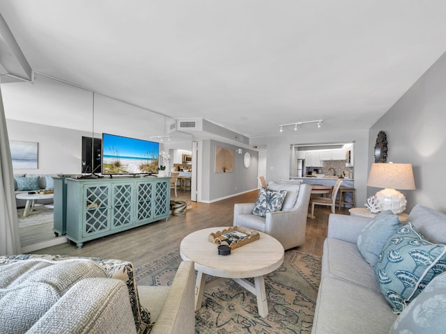 living room with hardwood / wood-style floors