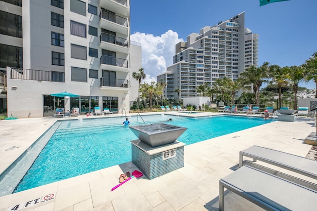 view of pool featuring a patio