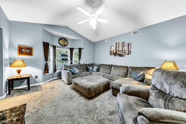 carpeted living room featuring ceiling fan and vaulted ceiling