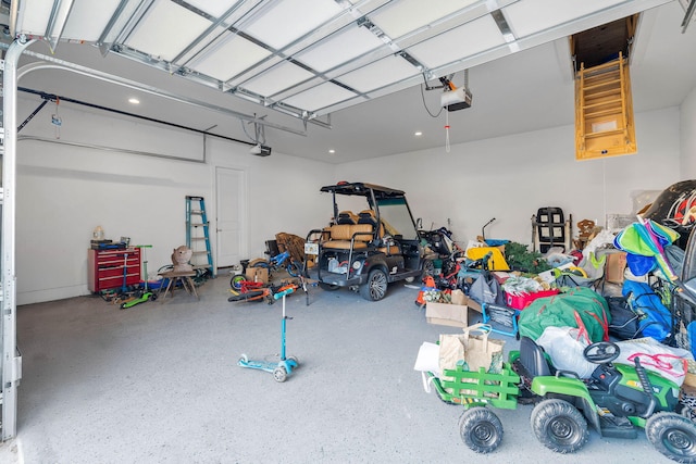 garage featuring a garage door opener