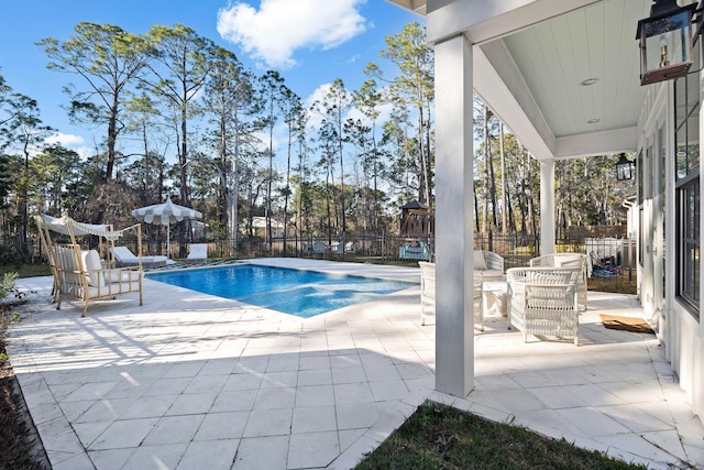 view of pool with a patio