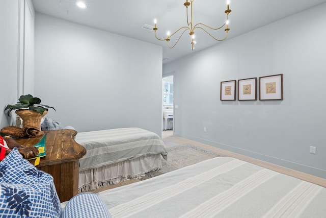 bedroom with a chandelier