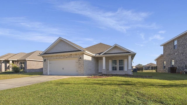 view of front of house with a front yard, a garage, and cooling unit