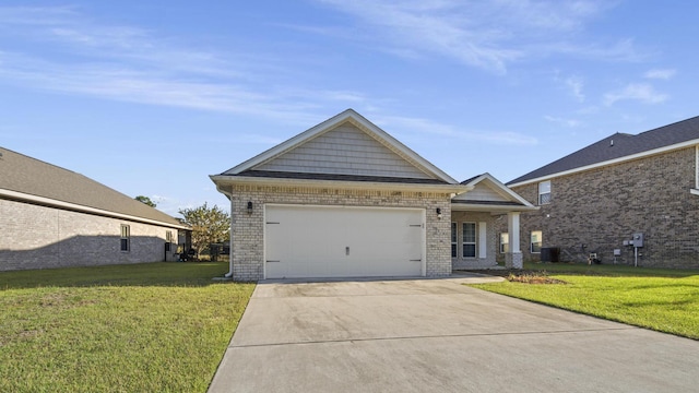 craftsman inspired home with a garage and a front lawn