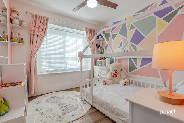 bedroom featuring hardwood / wood-style flooring