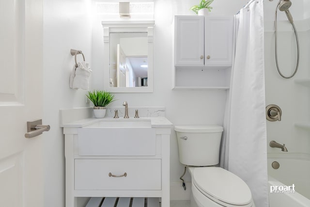 full bathroom featuring shower / bathtub combination with curtain, vanity, and toilet