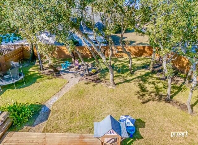 view of yard with a trampoline