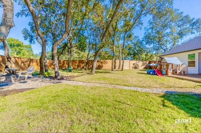 view of yard with a playground