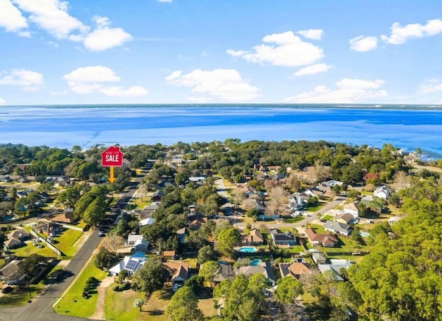 drone / aerial view with a water view