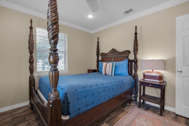 bedroom featuring ceiling fan, dark wood-type flooring, and ornamental molding