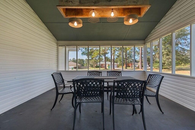 sunroom with lofted ceiling