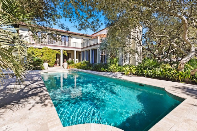 outdoor pool with a patio