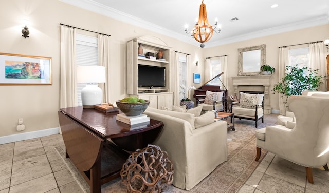 living room with crown molding, baseboards, and an inviting chandelier