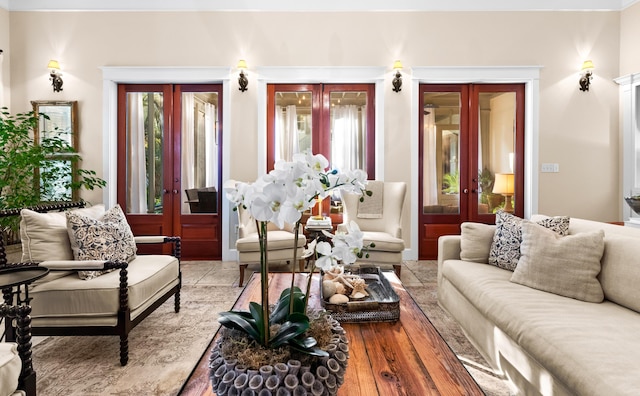 living room with plenty of natural light and french doors