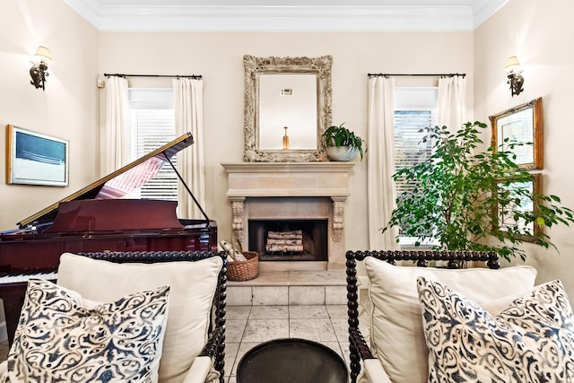 sitting room featuring a high end fireplace and crown molding