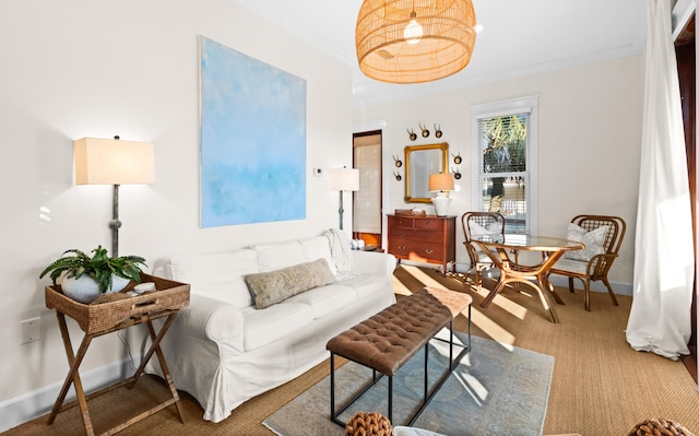 carpeted living area with baseboards and ornamental molding