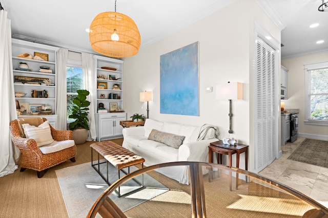 sitting room featuring ornamental molding, recessed lighting, and baseboards