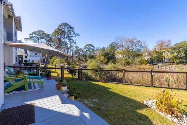 view of yard with a deck