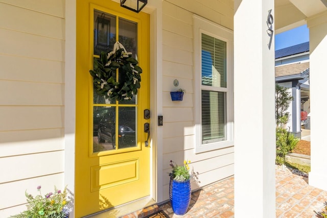 entrance to property with a porch