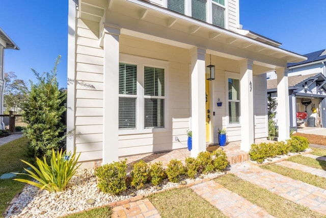 doorway to property with covered porch