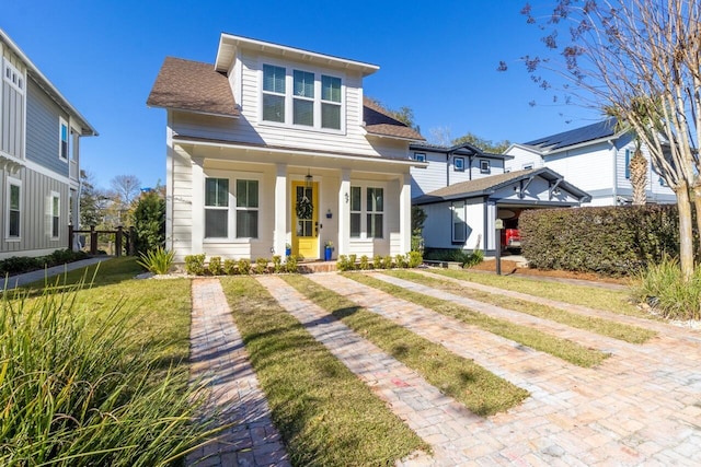 view of front of home with a front yard