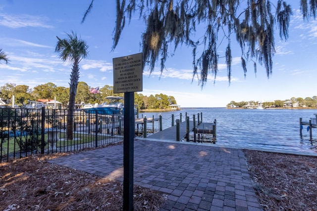 dock area featuring a water view