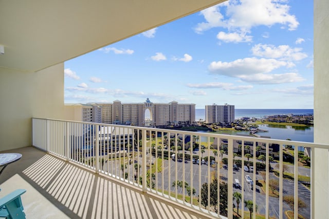 balcony featuring a water view