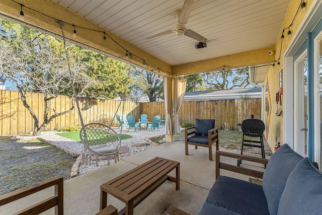 view of patio with ceiling fan