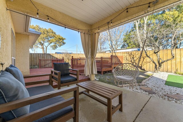 view of patio featuring a deck