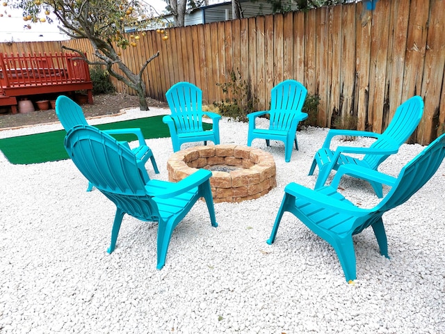 view of patio / terrace featuring a fire pit