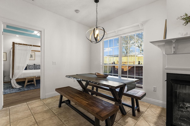 dining room featuring light tile patterned flooring