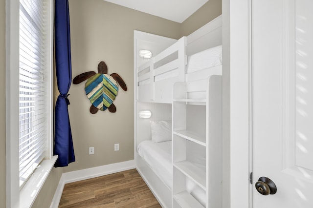 bedroom featuring dark wood-type flooring