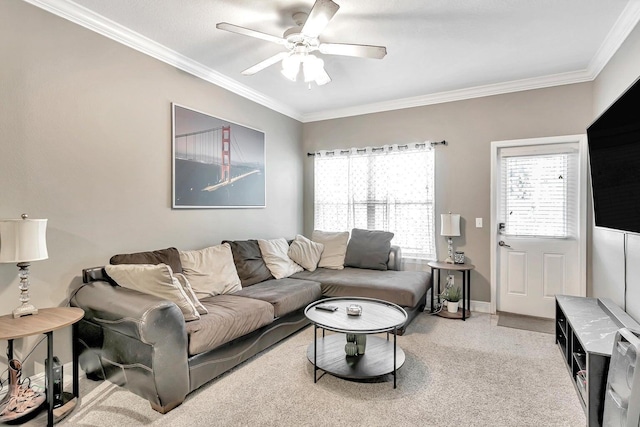 living room featuring ceiling fan and ornamental molding